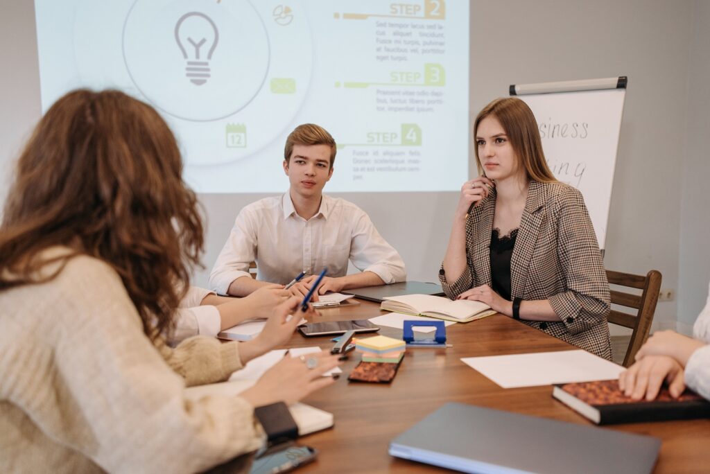 https://www.pexels.com/photo/people-having-a-meeting-6340617/
